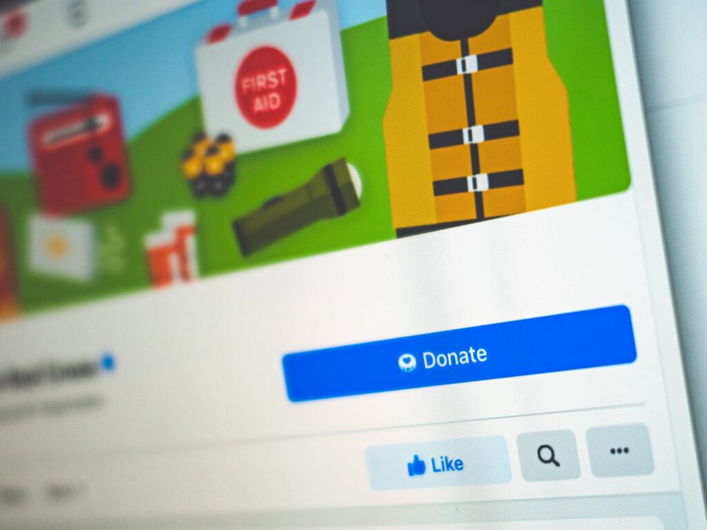 How to add a donate button on facebook post?